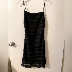 Little black dress, Sz M, with short little Fringe detail.